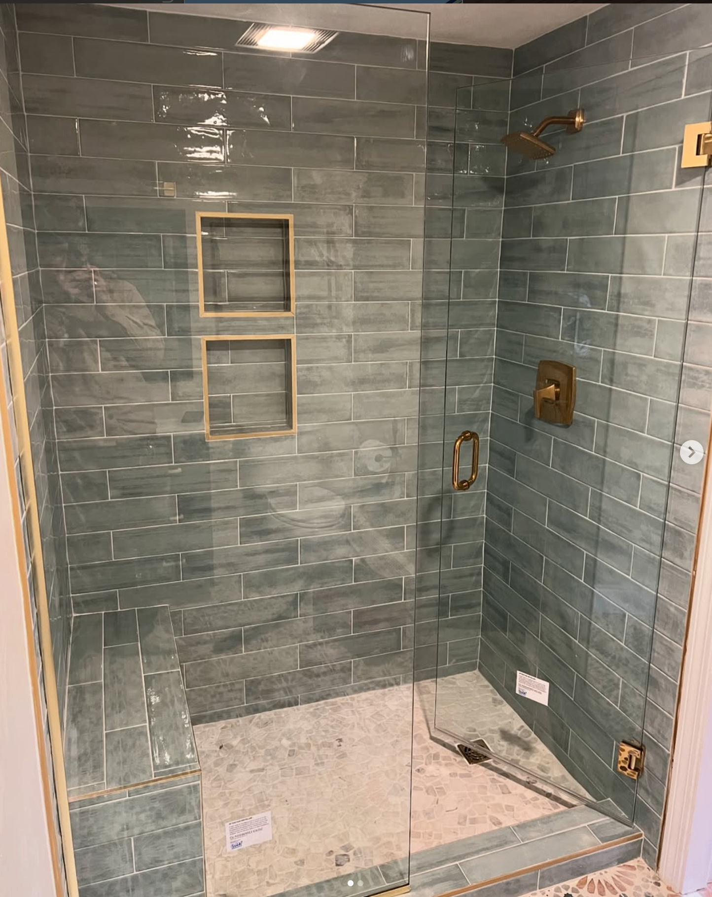 Custom tile shower with brass fixtures